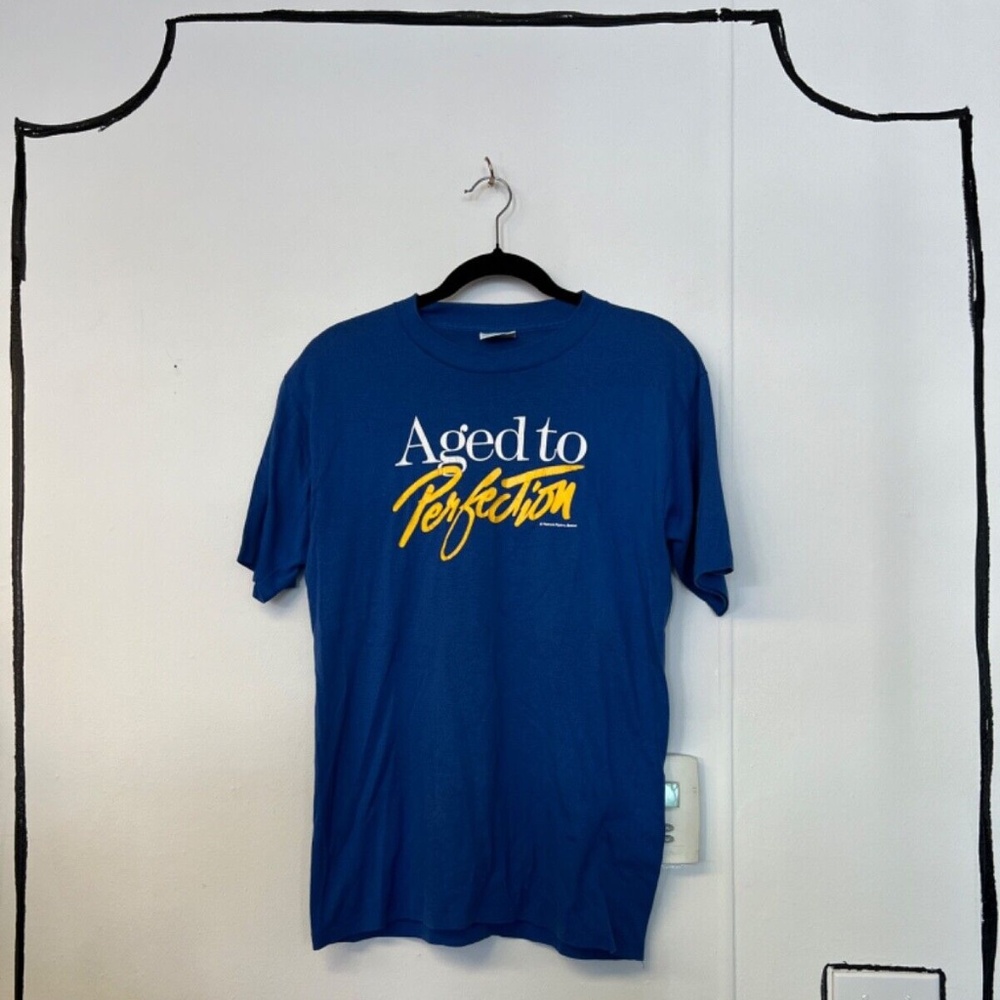 AGED TO PERFECTION Vintage T Shirt Hanes Beefy M Made USA Blue Peacock Papers